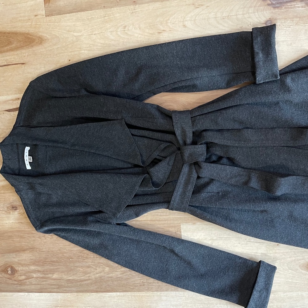 Cabi thigh length black wrap jacket size M
